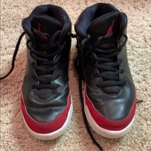 Boys leather Jordan’s size 1.  Red and black